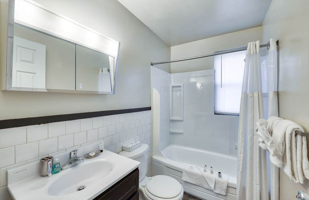 Bathroom with a bathtub at Northwest Townhomes in Baltimore, Maryland