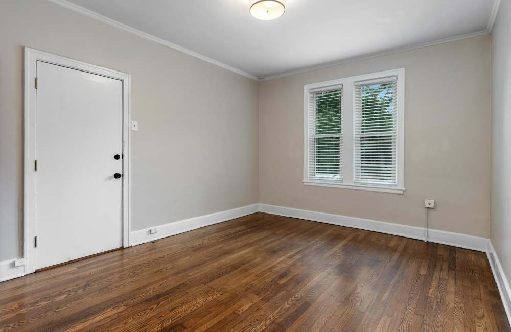 Bedroom with large windows at Stonewall Park in Memphis, Tennessee