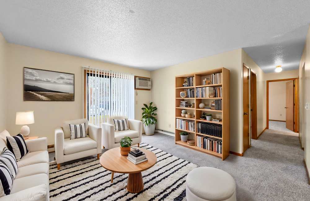 Living room with attached patio at Eastwood on Grand in West Des Moines, Iowa