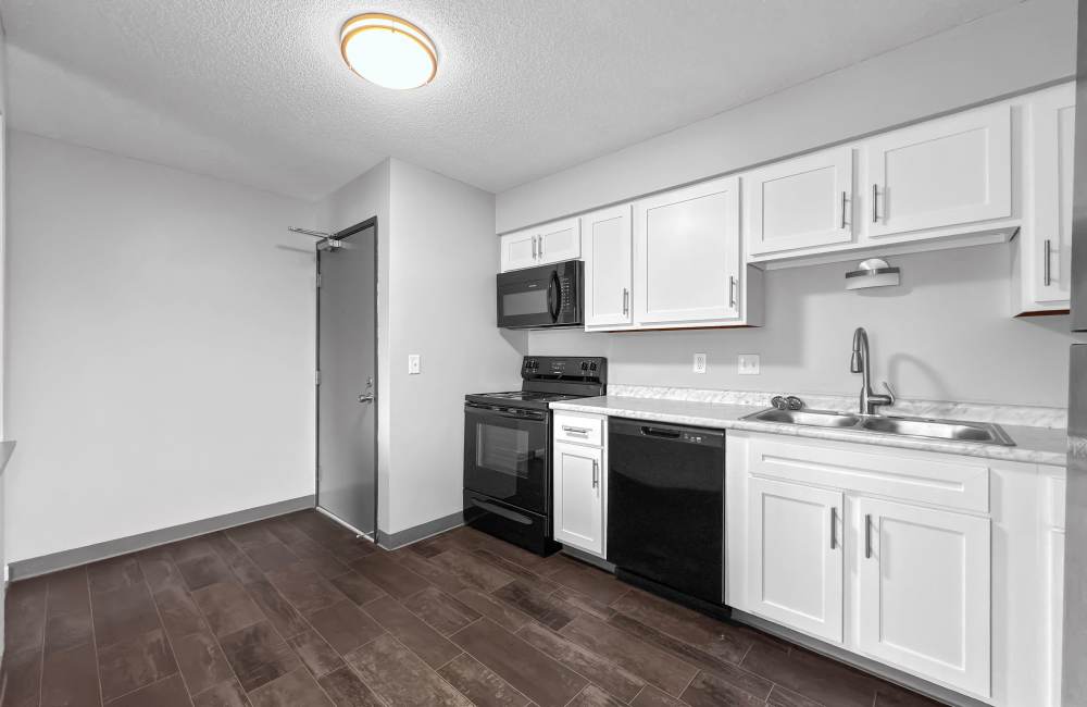 Kitchen with white color cabinets at Eastwood on Grand in West Des Moines, Iowa 