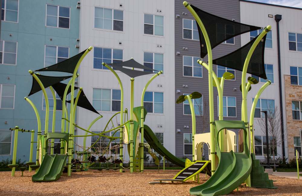 Apartment playground at Norman Commons in , Texas