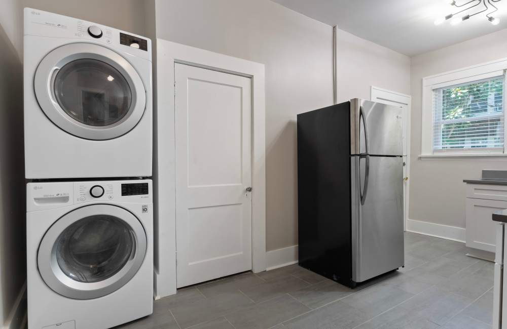 Laundry unit near kitchen at The Alma in Memphis, Tennessee