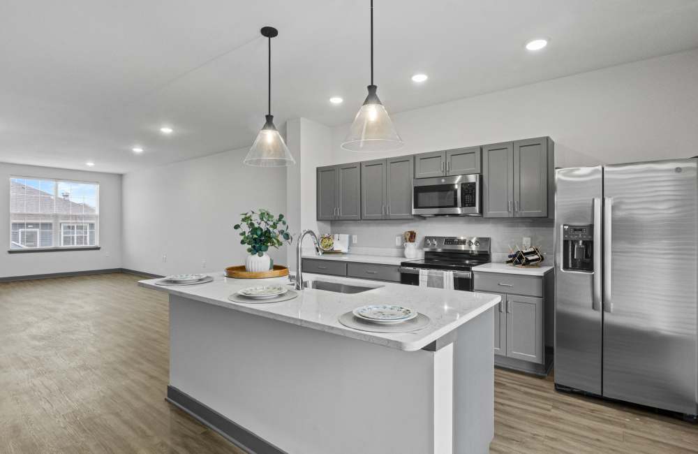 Kitchen with stainless steel appliance at Ashgrove Farms Townhomes in Nicholasville, Kentucky