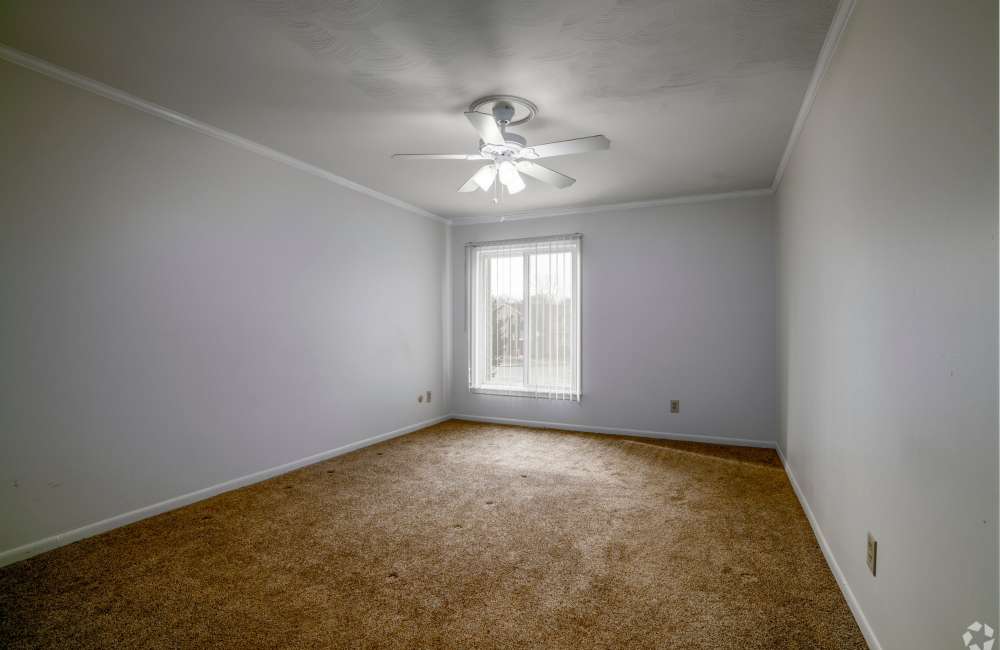 Ceiling fan light in a living room at Cambridge Manor Apartments in Lansing, Michigan