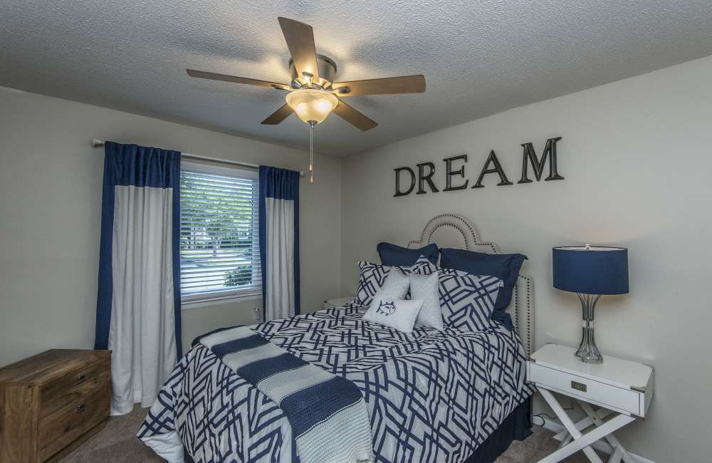 Bedroom with windows at James Towne Village in Charleston, South Carolina