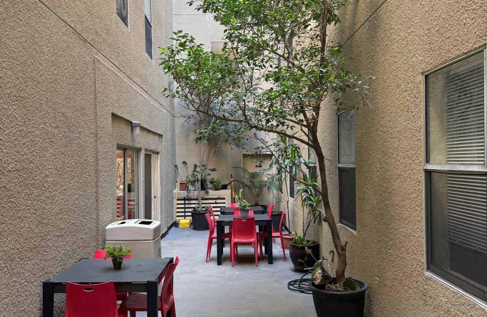 Outdoor seating space at Trolley Court in San Diego, California