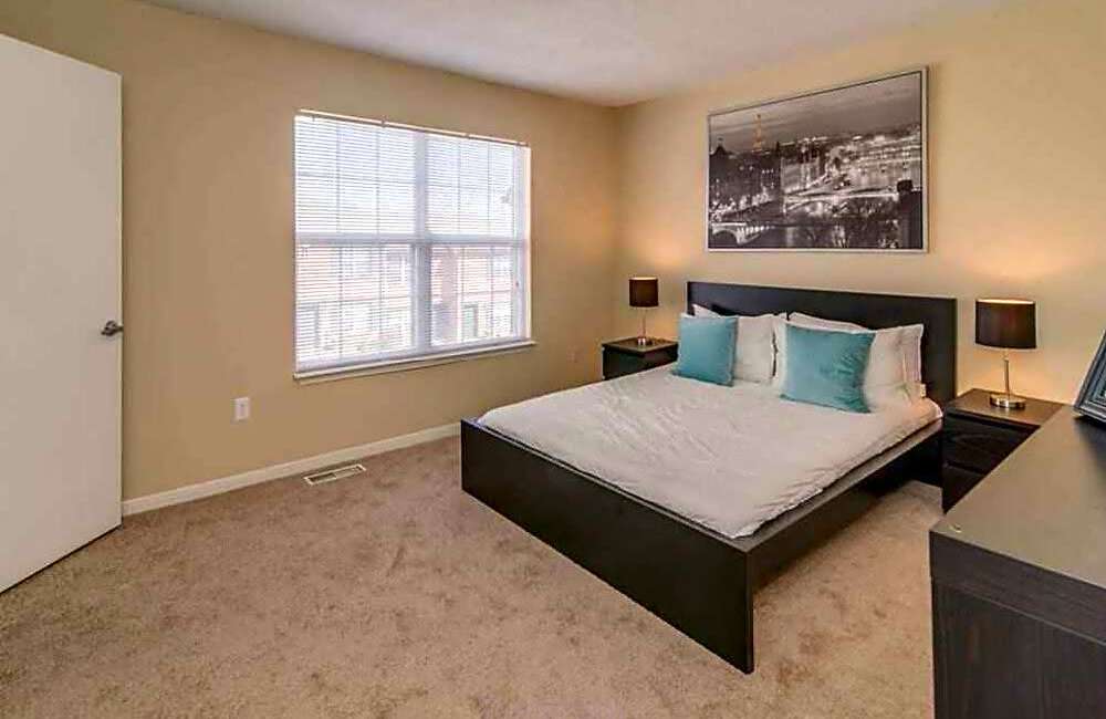 Carpeted bedroom at Mountain Brook Townhomes in Nashville, Tennessee