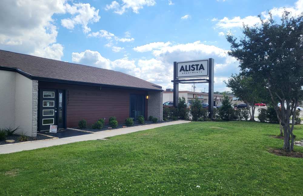 The Alista Leasing Office and Monument Sign with landscaping