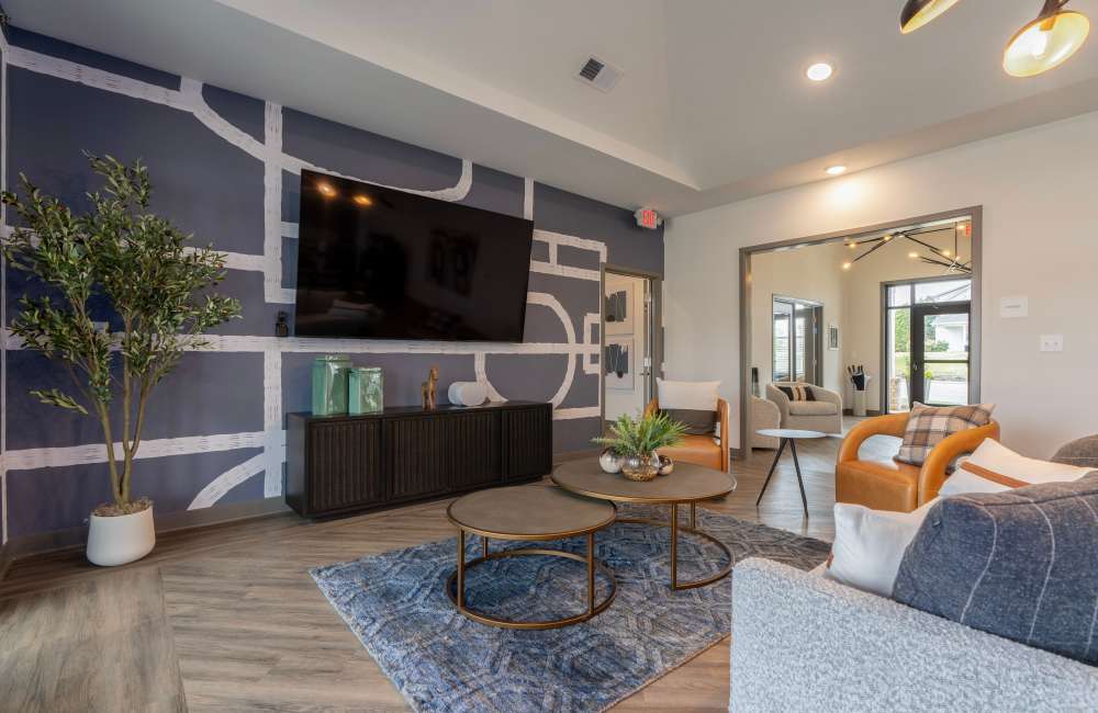 Clubhouse lounge with seating at Ashgrove Farms Townhomes in Nicholasville, Kentucky