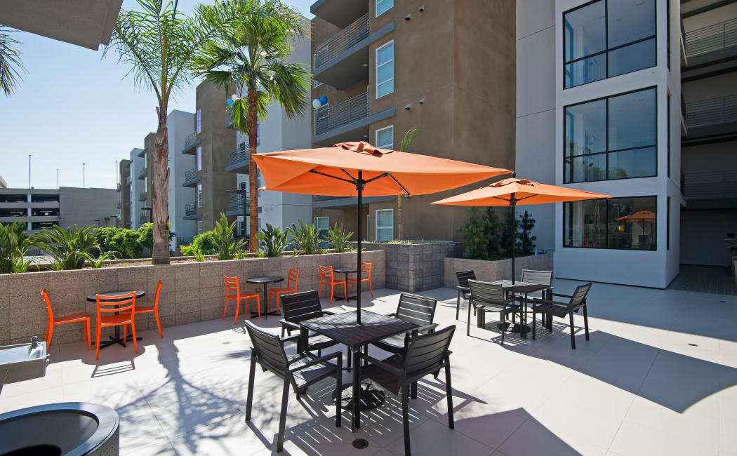 Shaded seating and plenty of space at rooftop patio area at IMT Sherman Circle in Van Nuys, California