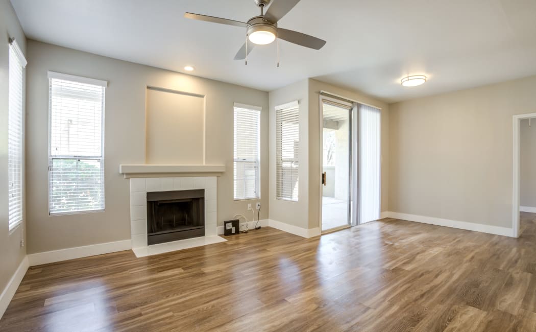 Hardwood flooring plus fireplace available at Lumiere Chandler in Chandler, AZ