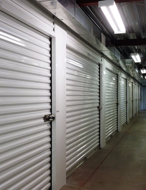 An inside hallway of storage units at Storage World in Sinking Spring, Pennsylvania