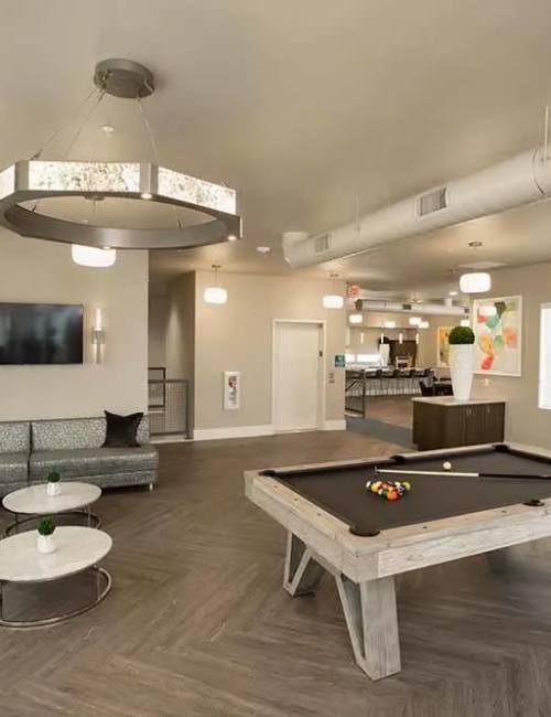 Clubhouse with pool table at Allure Apartments in Modesto, California