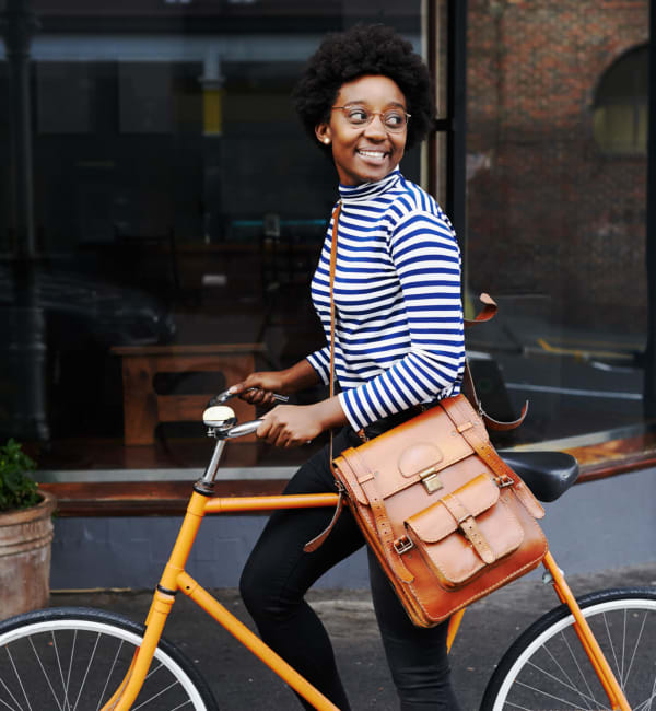 A woman on her bike near Mode at Owings Mills in Owings Mills, Maryland