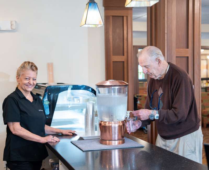 Resident ordering from bistro at York Gardens in Edina, Minnesota