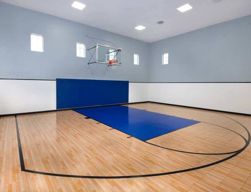 Indoor basketball court at Rancho Palisades in Dallas, Texas