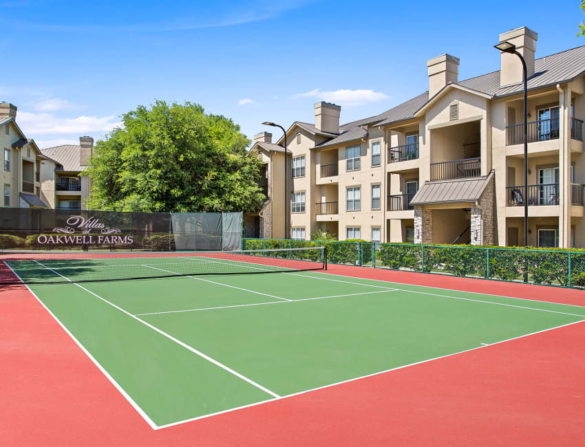 Full-sized tennis court at Villas at Oakwell Farms in San Antonio, Texas
