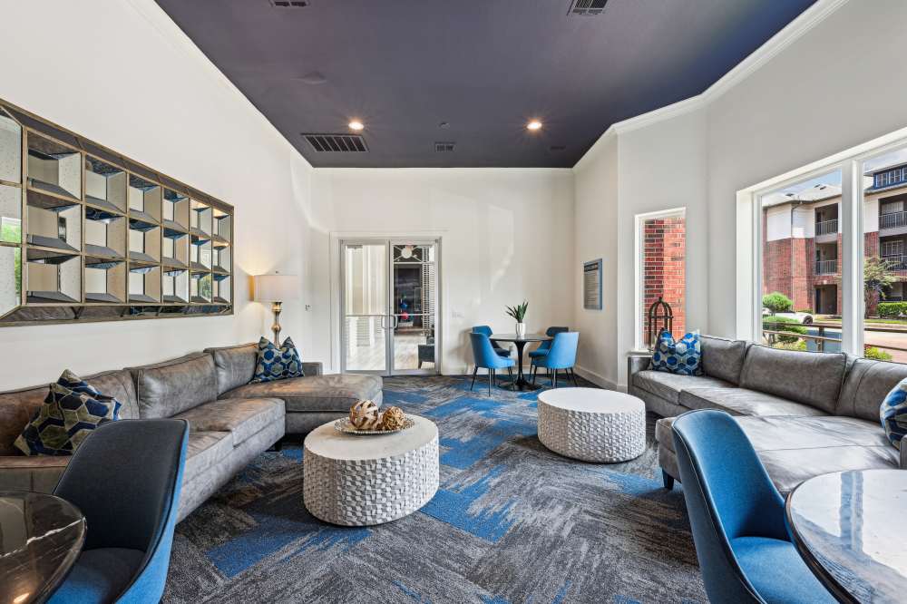 A cozy clubhouse interior featuring comfortable seating at Lakeside in Houston, Texas