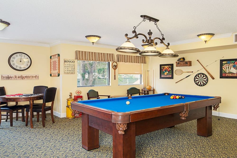 Blue pool table at Grand Villa of Ormond Beach in Florida