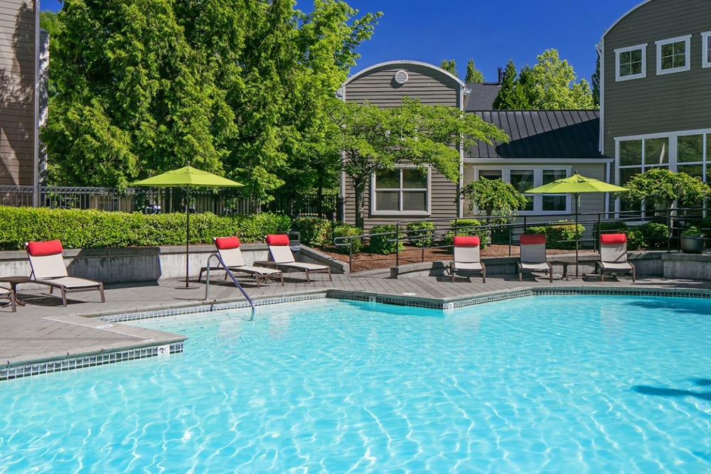 Comfortable poolside lounge chairs at Center Pointe Apartment Homes in Beaverton, Oregon