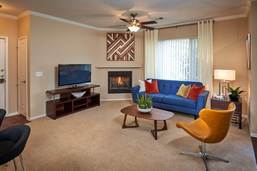 Living room at Legend Oaks Apartments in Aurora, Colorado