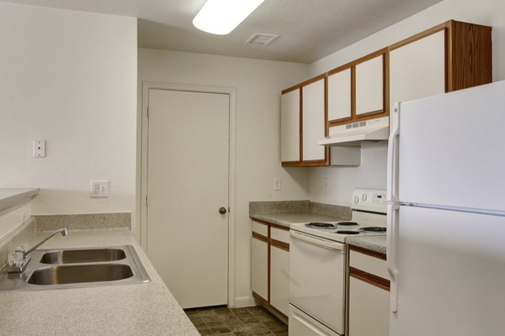 Kitchen at Sterling Park Apartments in Brighton, Colorado
