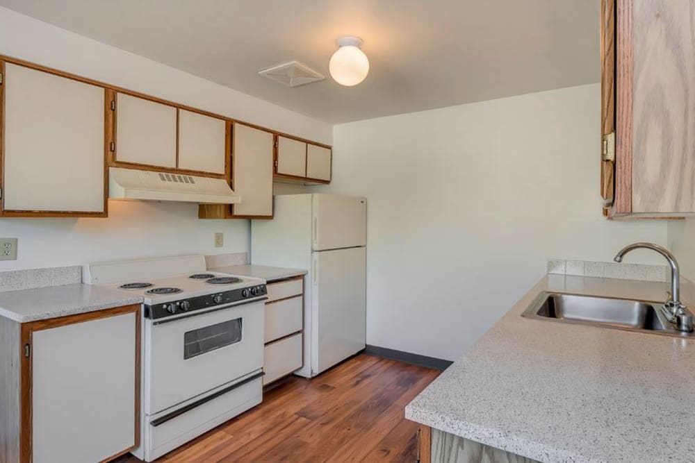 equipped kitchen at Courtside Apartments in Olympia, Washington