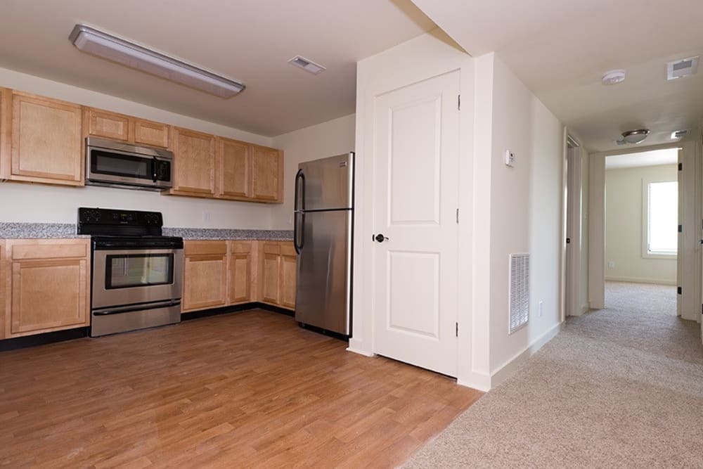 Kitchen with wood flooring at Lakewood Park Apartments in Lexington, Kentucky