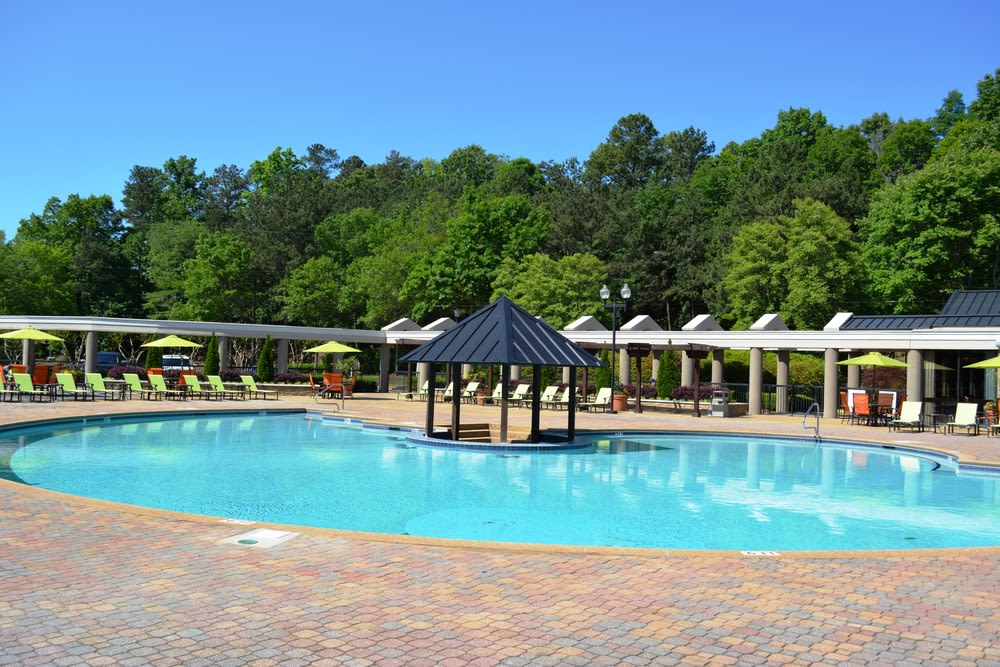 Swimming pool with cabanas at The Abbey at Inverness in Birmingham, Alabama