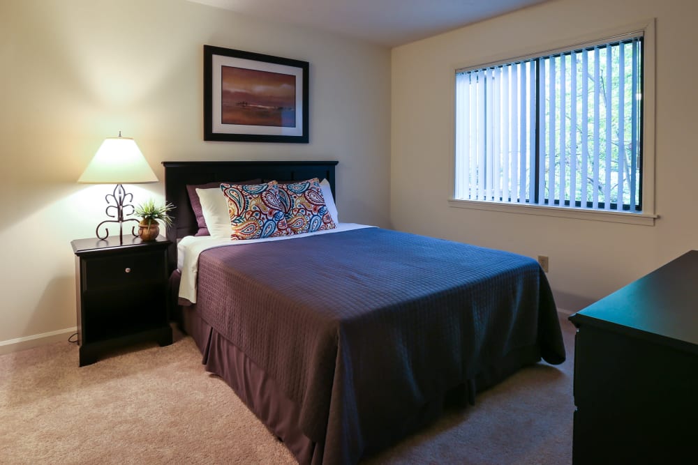 Bedroom at Riverwind Apartment Homes in Spartanburg, South Carolina.