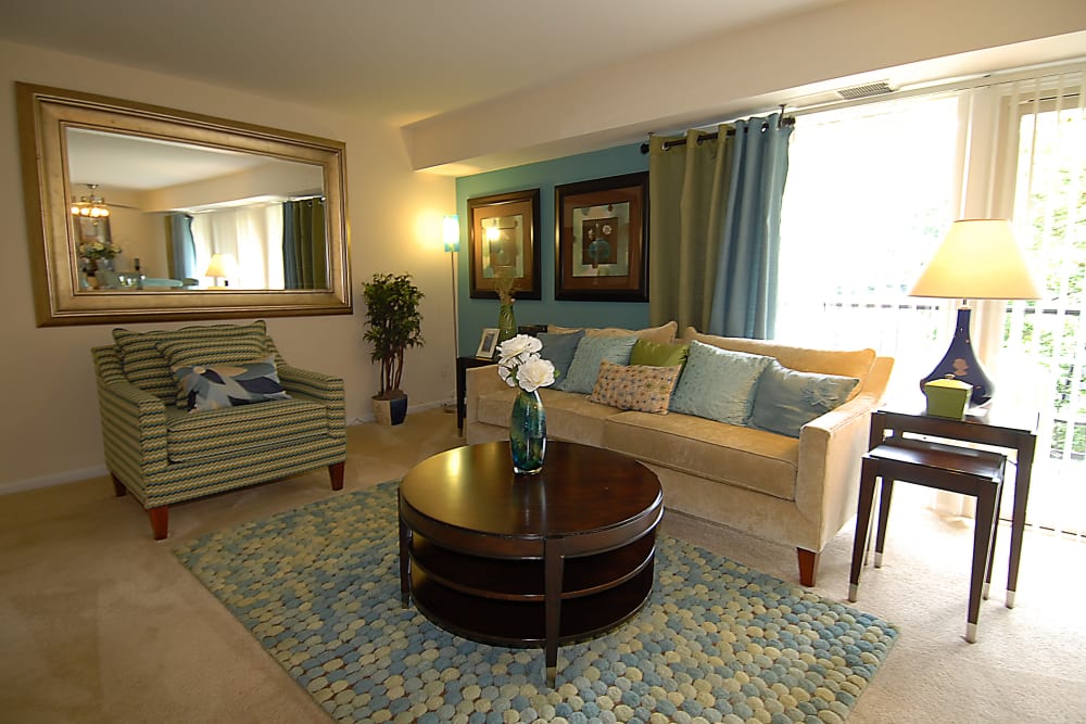 Living room in a home at Harbor Place Apartment Homes in Fort Washington, Maryland