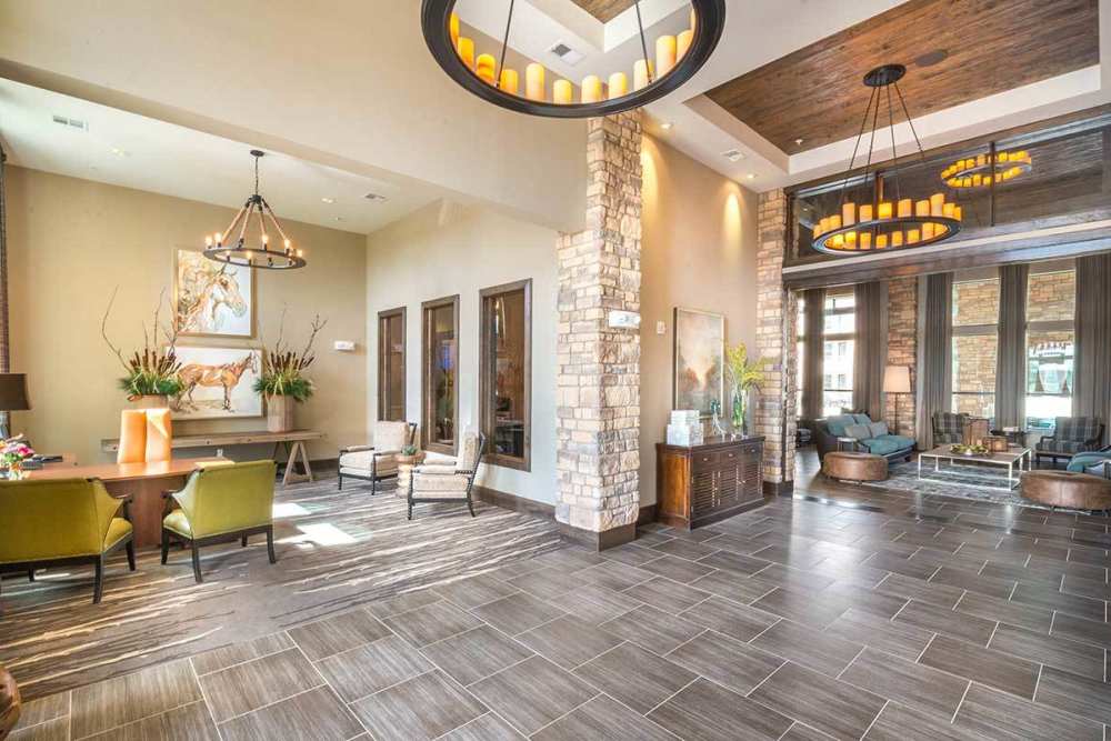 Large resident area for entertaining with kitchen and bar at The Abbey at Spring Town Center in Spring, Texas