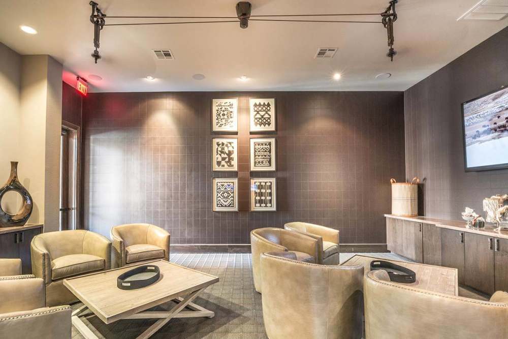 Large community movie theater with comfortable seats at The Abbey at Spring Town Center in Spring, Texas