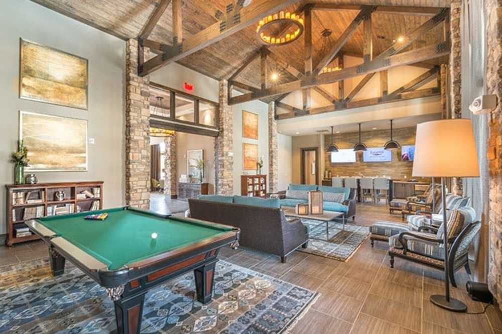 Spacious game room with snooker table at The Abbey at Spring Town Center in Spring, Texas