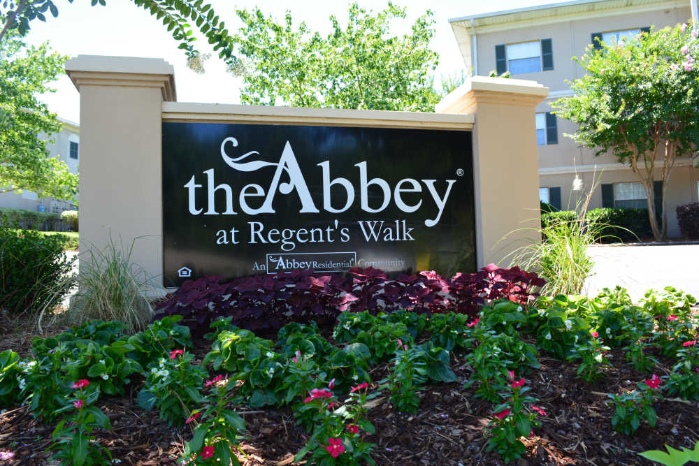 Apartment sign at entrance at The Abbey at Regent's Walk in Homewood, Alabama