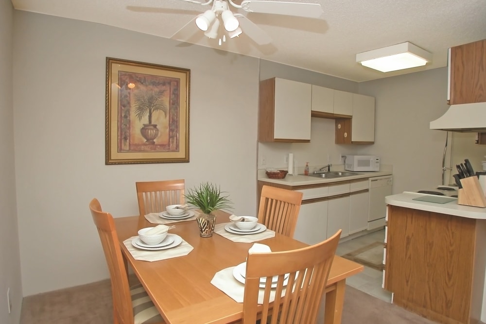 Dining room and kitchen at Stonesthrow Apartment Homes in Greenville, South Carolina