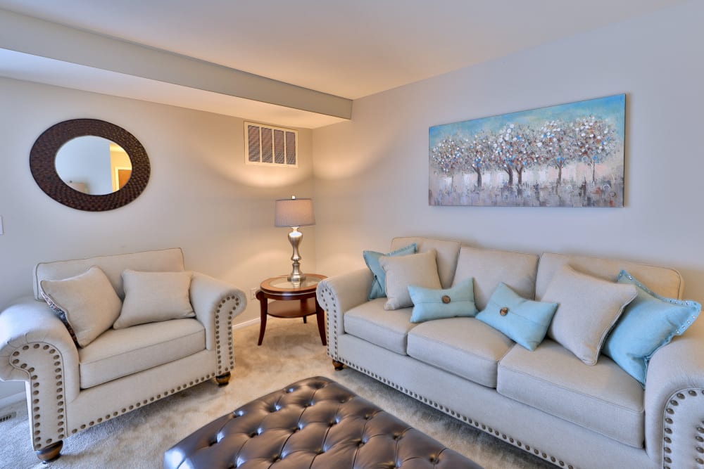 Enjoy a luxury living room at The Village of Chartleytowne Apartments & Townhomes