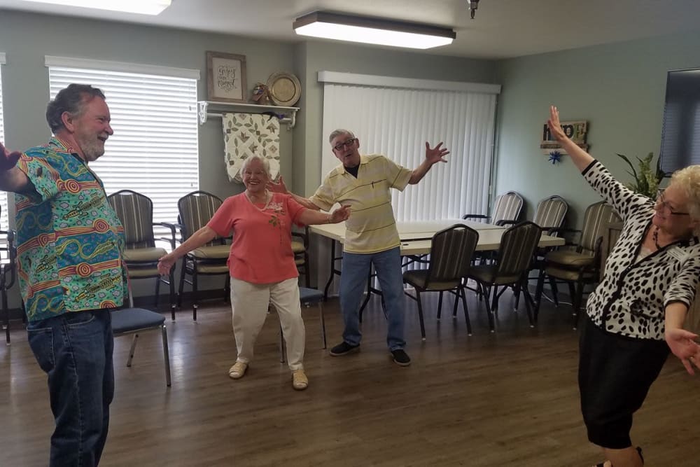 Residents dancing during a fun event at Shorewood Senior Living in Florence, Oregon