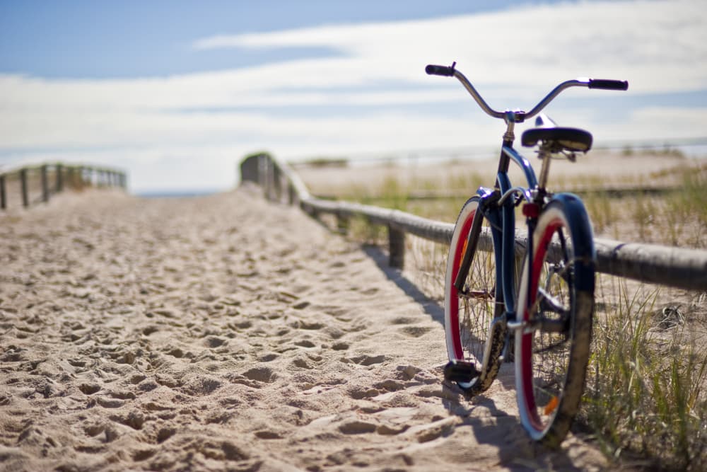 A bicycle on a sandy east coast beach