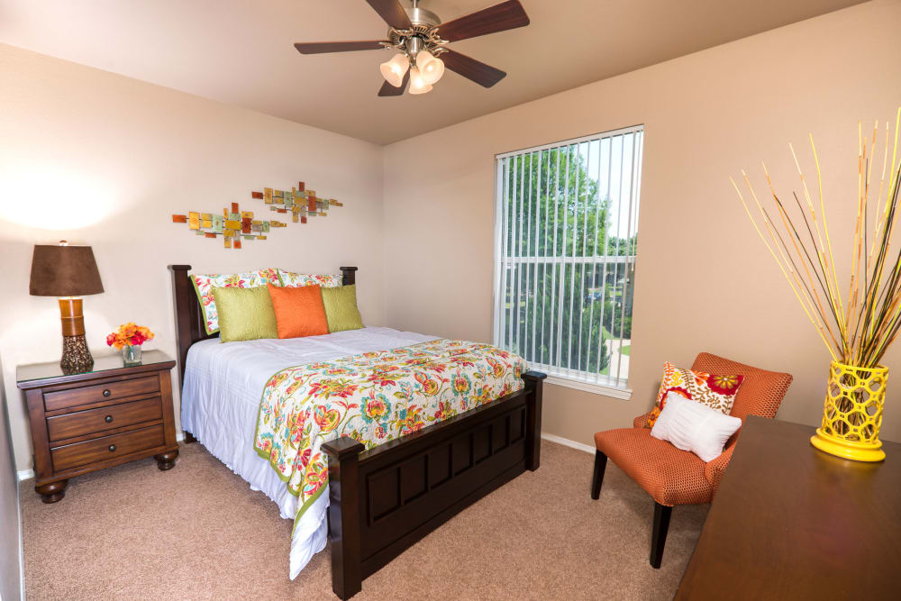 Our apartments at Lakeview at Parkside in Farmers Branch, Texas have a cozy bedroom