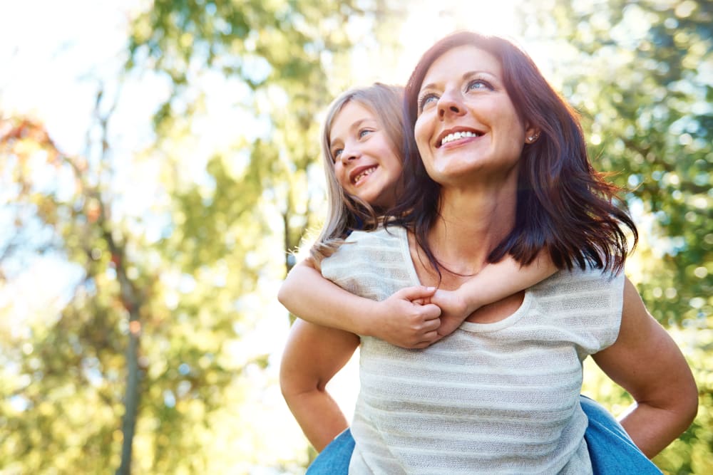Mother and daughter taking a walk near Heatherwood Apartments in Sacramento, California