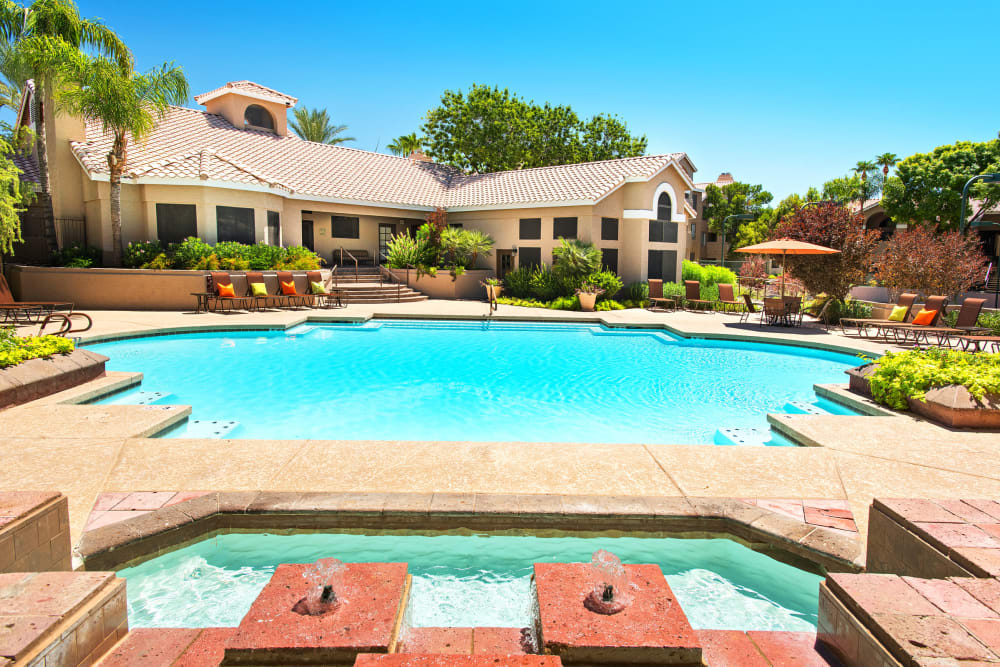 Swimming pool with outdoor spa at The Palisades in Paradise Valley 