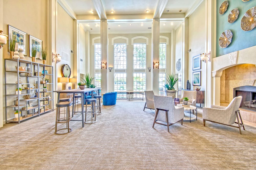 Clubhouse interior at Signature Point Apartments in League City, Texas