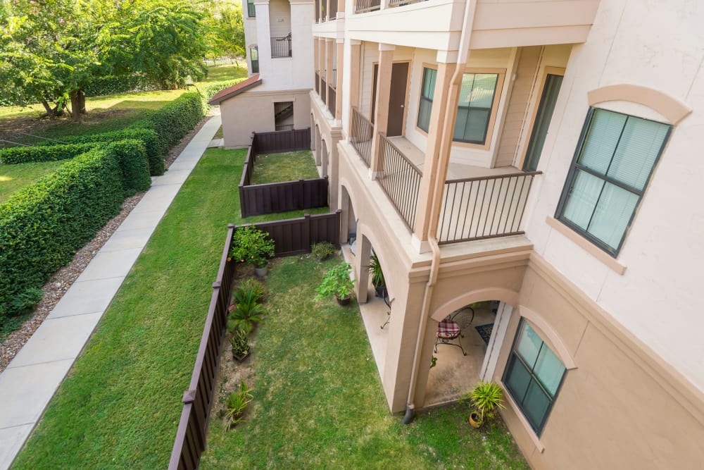 View of balconies and enclosed backyards at Villas at Medical Center