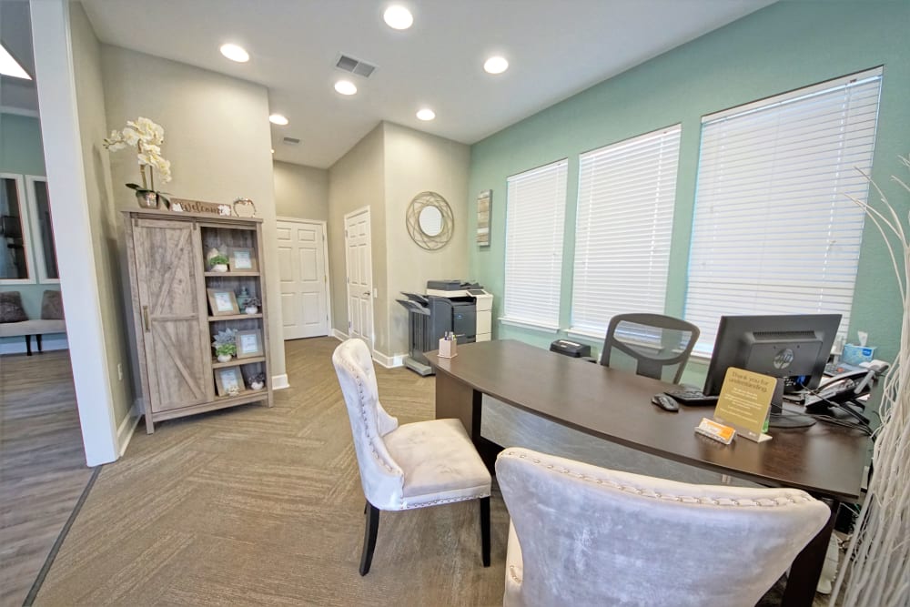 comfortable chairs in the clubhouse at Reserve at Centerra Apartment Townhomes in Loveland, Colorado