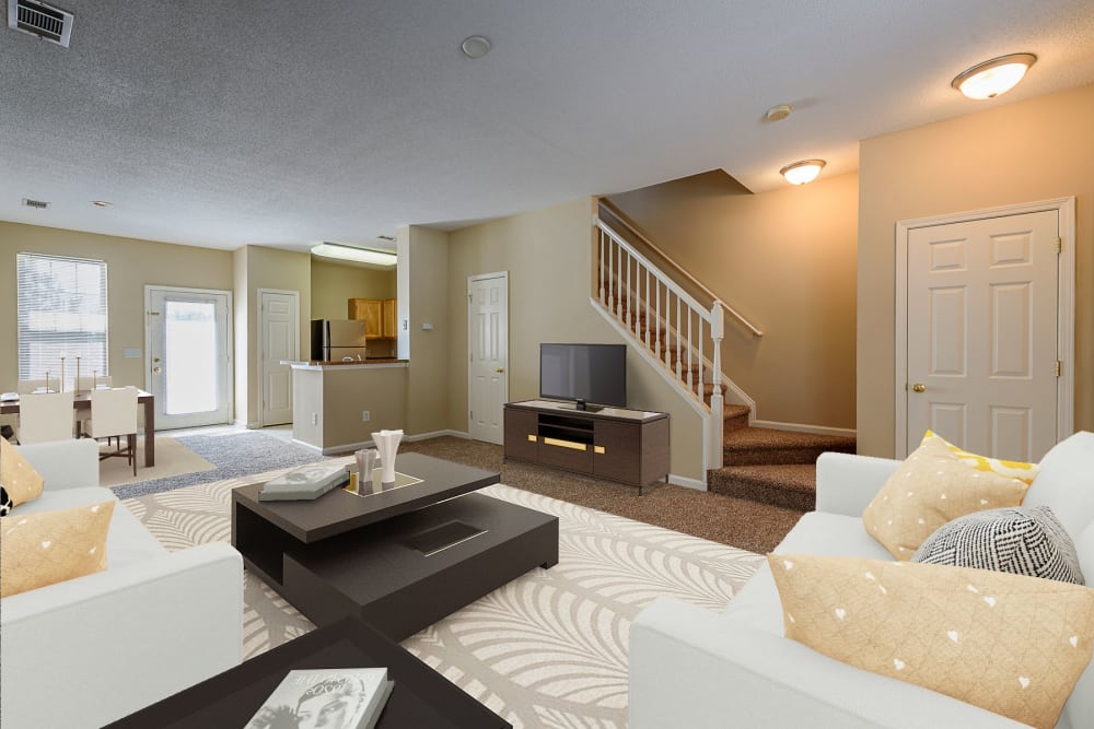 Spacious living area of a model townhome at Falls Creek Apartments & Townhomes in Raleigh, NC