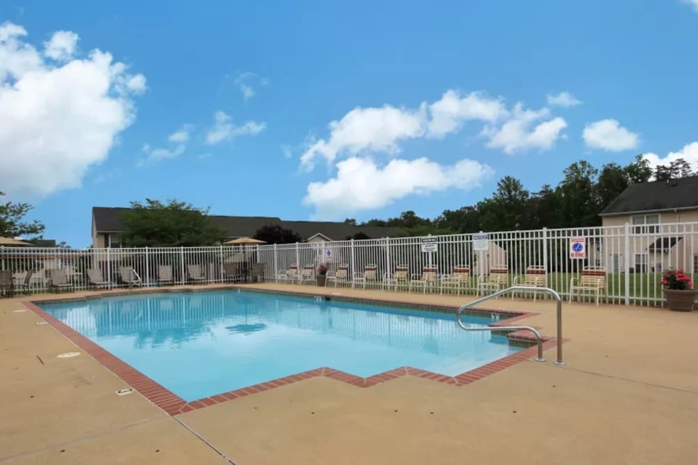A large swimming pool with a sundeck at Timber Ridge in Fredericksburg, Virginia