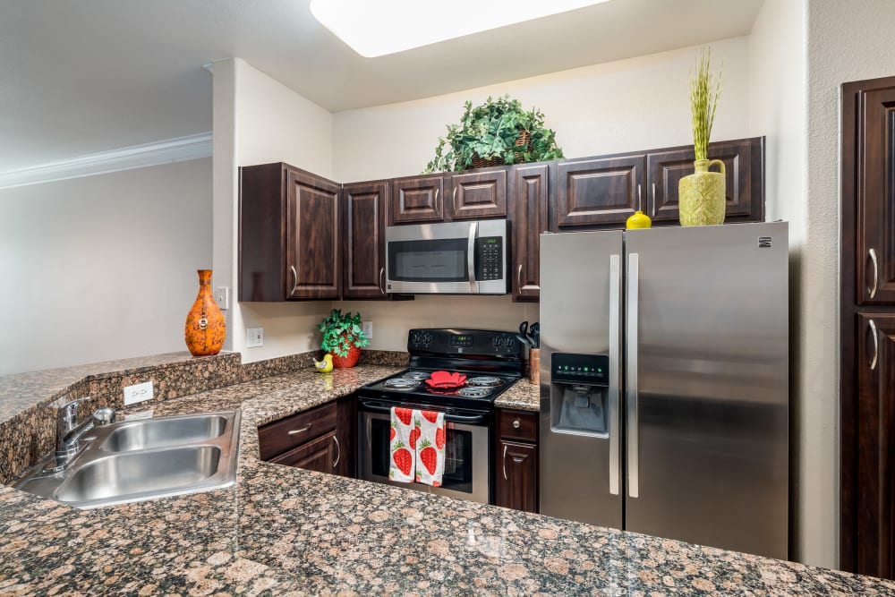 Kitchen with Stainless steel appliances at Villas at Parkside