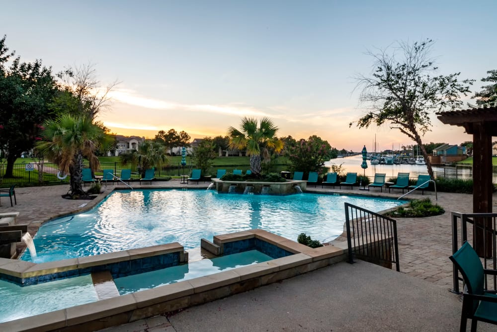 Twilight swimming pool at Signature Point Apartments