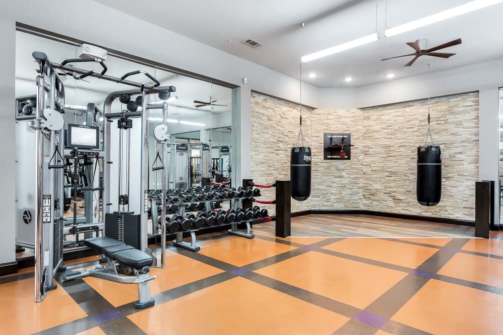 Weight lifting area in the fitness center at Villas at the Rim in San Antonio, Texas